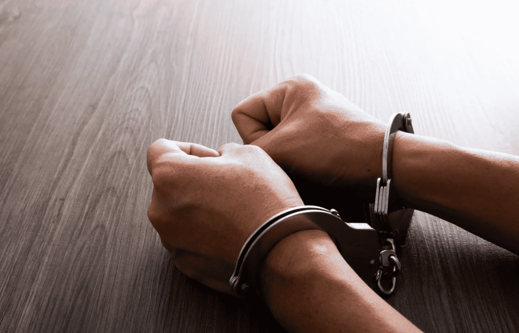 Client in handcuffs needs criminal defense attorney